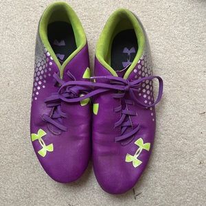 Purple and green under armour cleats